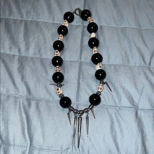 Black Bead Necklace with Skull Accents and Spike Charms